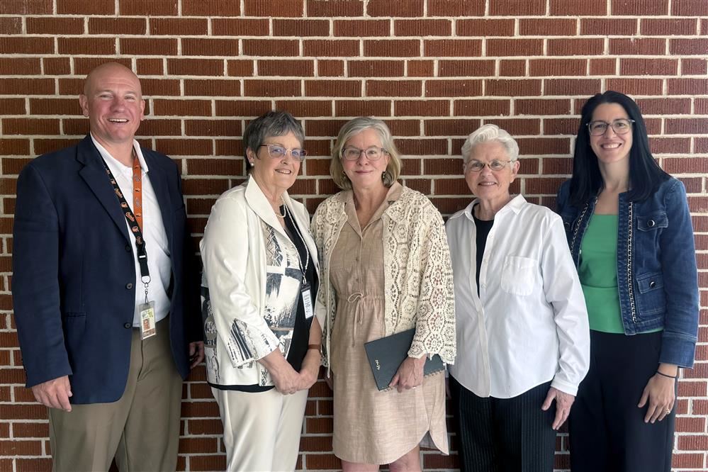  Image of GCPS and Let's Drive representatives posed together.